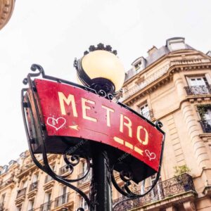 Vintage Paris Metro Sign And City Buildings
