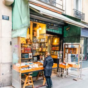 Vintage Paris Bookstore With Street Reader Scene