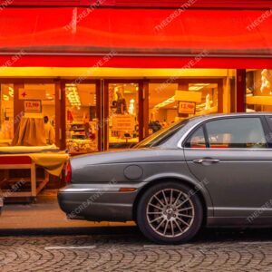 Gray Car Parked Outside Paris Boutique Display