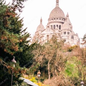 Sacre Coeur Basilica Behind Parisian Greenery Hill