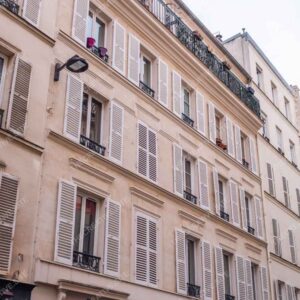 Parisian Shuttered Windows On Cream Apartment Building