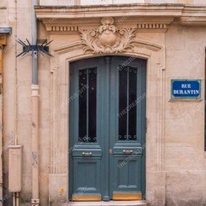 Elegant Parisian Blue Door With Ornate Stone Details