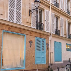 Parisian Facade With Blue Shutters And Vintage Lamp