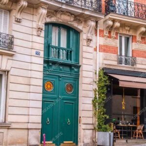 Green Ornate Parisian Door With Iron Balconies