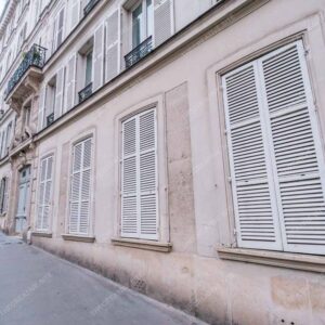 Parisian Street With White Shuttered Windows