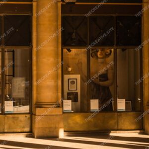Golden Columns Of Parisian Palace In Warm Sunlight