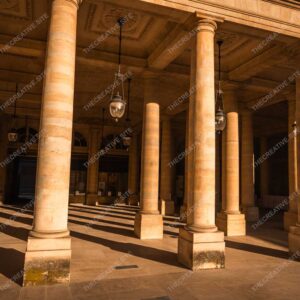 Golden Columns Of Parisian Palace In Warm Sunlight