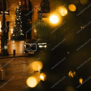 Luxury Car And Christmas Lights On Parisian Plaza Night
