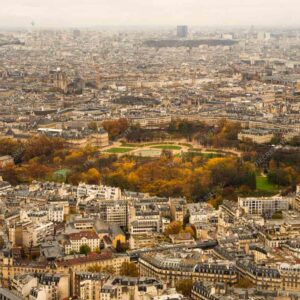 Paris Cityscape With Autumn Trees And Historic Buildings