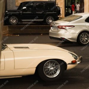 Classic Cream Jaguar E-Type On Parisian Street