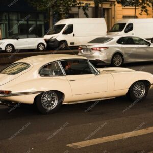 Classic Cream Jaguar E-Type On Parisian Street