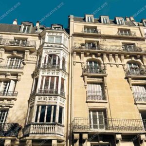 Parisian Building Facades With Ornate Balconies