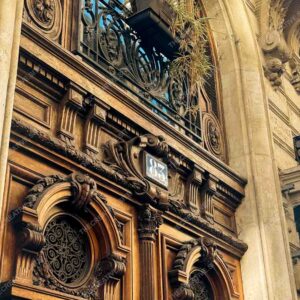 Ornate Parisian Wooden Door With Balcony Ironwork