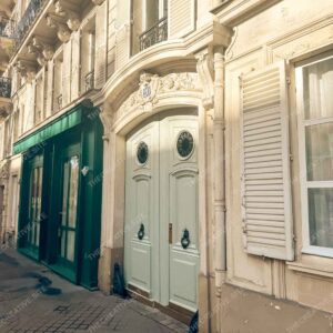 Paris Mint Green Door With Ornate Shutters And Carvings