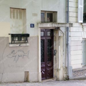Parisian Wooden Door Entrance with Street Art at Number 16